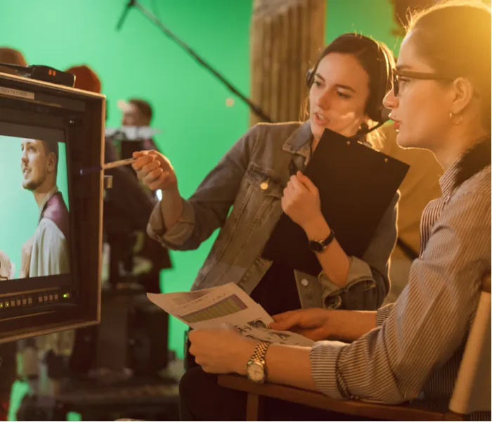 Women directing a film production