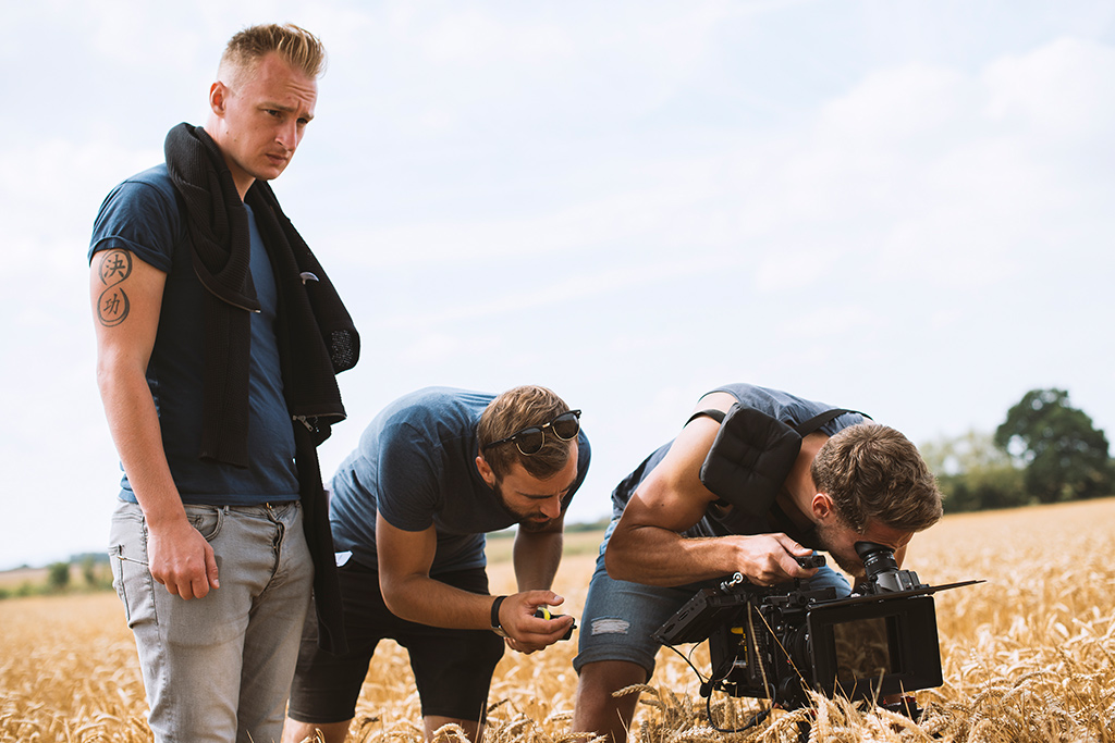 Filming in a field